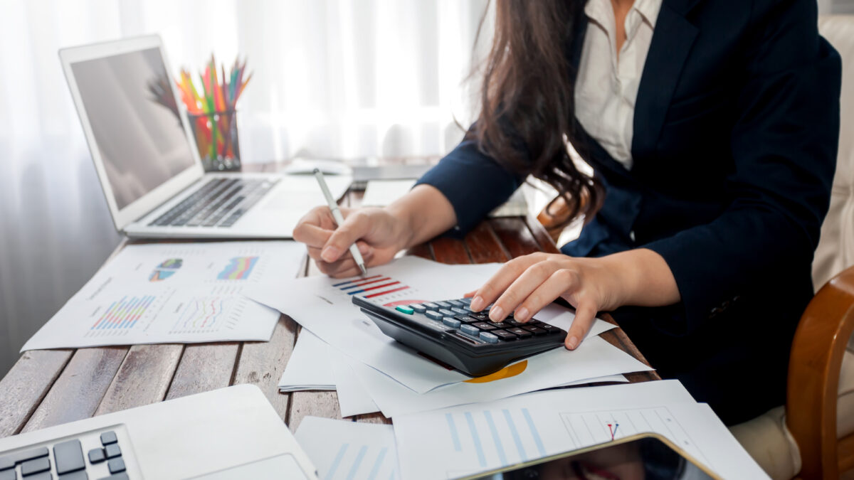 Business women analyzing compensation data.